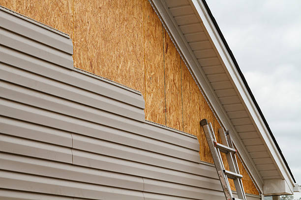 Professional Emergency Siding Repair technician working in Rebuck, PA